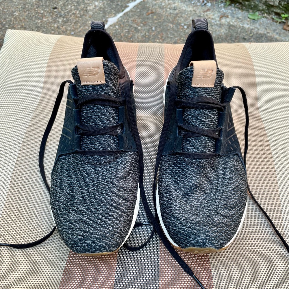 New Balance Men’s size 9.5 grey and black 
with gum sole.